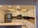Modern kitchen with white cabinets and recessed lighting at 6447 Egret Ln # 413, Bradenton, FL 34210
