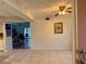 View of living room, kitchen and access to outside at 6447 Egret Ln # 413, Bradenton, FL 34210