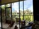 Enjoy water views from this screened porch, complete with comfortable seating at 6447 Egret Ln # 413, Bradenton, FL 34210