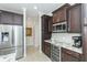 Kitchen boasts stainless steel appliances and granite countertops at 85 Spaniards Rd, Placida, FL 33946
