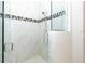 Large walk-in shower with tile surround and glass enclosure at 85 Spaniards Rd, Placida, FL 33946