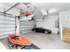Garage with car and overhead storage for kayaks at 85 Spaniards Rd, Placida, FL 33946