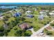 Residential area with multiple homes and lush landscaping at 85 Spaniards Rd, Placida, FL 33946