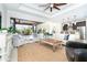 Open concept living room and kitchen with sliding doors to pool at 85 Spaniards Rd, Placida, FL 33946