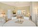 Dining room with a view into kitchen and living areas at 5644 Ashton Lake Dr # 5644, Sarasota, FL 34231