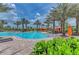 Expansive resort-style pool with cabanas and lounge chairs at 13902 Messina Loop, Bradenton, FL 34211