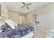 Cozy bedroom with a queen-size bed and lots of natural light at 13902 Messina Loop, Bradenton, FL 34211