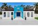 Stunning waterfront home with unique design and blue accents at 1521 Siesta Dr, Sarasota, FL 34239