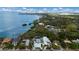 Aerial view showing home's location near waterfront at 1521 Siesta Dr, Sarasota, FL 34239