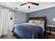 Main bedroom with king bed and access to patio at 1521 Siesta Dr, Sarasota, FL 34239