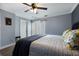 Main bedroom with king-size bed and sliding door to patio at 1521 Siesta Dr, Sarasota, FL 34239