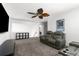 Cozy living area featuring comfortable seating and a view of the upstairs landing at 1868 Scarlett Ave, North Port, FL 34289