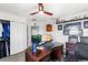 Spacious office with custom shelving, closet, and large desk area at 1868 Scarlett Ave, North Port, FL 34289