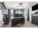 Home office featuring dual monitors, large desk, and window with curtains at 1868 Scarlett Ave, North Port, FL 34289