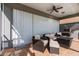 Relaxing covered patio with comfortable seating and retractable screens at 1868 Scarlett Ave, North Port, FL 34289