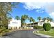 The Hideaway community with lush landscaping and palm trees at 381 Bobby Jones Rd # 381, Sarasota, FL 34232