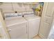 Convenient laundry closet with washer and dryer hookups at 381 Bobby Jones Rd # 381, Sarasota, FL 34232