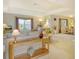 Spacious living room with beige couches and ample natural light at 381 Bobby Jones Rd # 381, Sarasota, FL 34232