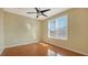 Bedroom with wood floors and a ceiling fan at 4134 Central Sarasota Pkwy # 1734, Sarasota, FL 34238