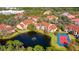 Aerial view of building near lake and tennis courts at 4134 Central Sarasota Pkwy # 1734, Sarasota, FL 34238