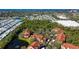 Aerial view of building near lake and other buildings at 4134 Central Sarasota Pkwy # 1734, Sarasota, FL 34238