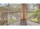 Private screened balcony overlooking trees and water at 4134 Central Sarasota Pkwy # 1734, Sarasota, FL 34238