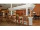 Community kitchen with bar seating and modern appliances at 4134 Central Sarasota Pkwy # 1734, Sarasota, FL 34238