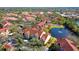 Aerial view of building near lake and tennis courts at 4134 Central Sarasota Pkwy # 1734, Sarasota, FL 34238