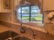 Kitchen with double sink, window overlooking lake at 449 Botticelli Dr # 449, Nokomis, FL 34275