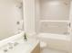 Modern bathroom featuring a soaking tub, double vanity, and sleek fixtures at 4950 Remington Dr # 108, Sarasota, FL 34234