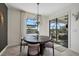 Bright dining room with large windows and a view of the water at 5054 Seafoam Trl, Bradenton, FL 34211