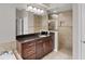 Bathroom with vanity, shower, and granite countertop at 575 Fore Dr, Bradenton, FL 34208