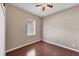 Well-lit bedroom with hardwood floors and window at 575 Fore Dr, Bradenton, FL 34208