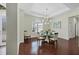 Elegant dining area featuring hardwood floors and a round table at 575 Fore Dr, Bradenton, FL 34208