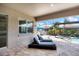 Relaxing lanai with pool access and lounge chairs at 575 Fore Dr, Bradenton, FL 34208