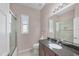 Bathroom with shower, vanity, and granite countertop at 575 Fore Dr, Bradenton, FL 34208
