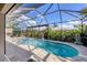 Enclosed pool and spa with retractable shade at 575 Fore Dr, Bradenton, FL 34208