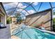 Enclosed pool and spa with retractable shade at 575 Fore Dr, Bradenton, FL 34208