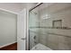 Bathroom with shower, tub, and glass enclosure at 575 Fore Dr, Bradenton, FL 34208