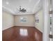 Large living room with hardwood floors and ceiling fan at 575 Fore Dr, Bradenton, FL 34208