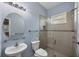 Clean bathroom with a walk-in shower and updated fixtures at 575 Fore Dr, Bradenton, FL 34208