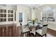 Formal dining room with hardwood floors and built-in shelving at 575 Fore Dr, Bradenton, FL 34208