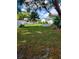 Backyard view of a home with a chain link fence at 5804 15Th W St, Bradenton, FL 34207