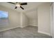 Bedroom with wood-look floors, ceiling fan and built-in nook at 6227 Blue Runner Ct, Lakewood Ranch, FL 34202
