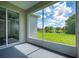 Enjoy the view from this screened porch overlooking the lake at 6227 Blue Runner Ct, Lakewood Ranch, FL 34202