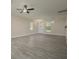 Living room with hardwood floors, recessed lighting, and a ceiling fan at 6227 Blue Runner Ct, Lakewood Ranch, FL 34202