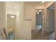 Upstairs hallway with wood-look floors and ceiling fan at 6227 Blue Runner Ct, Lakewood Ranch, FL 34202