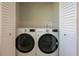 Laundry room with side-by-side washer and dryer at 6227 Blue Runner Ct, Lakewood Ranch, FL 34202