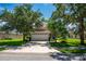 Two-story home with attached garage and landscaped yard at 6227 Blue Runner Ct, Lakewood Ranch, FL 34202