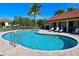 Relaxing kidney-shaped community pool at 6248 Champions Row, Bradenton, FL 34210
